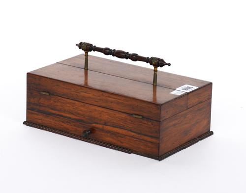 A REGENCY ROSEWOOD FOLD-OUT DESK TIDY