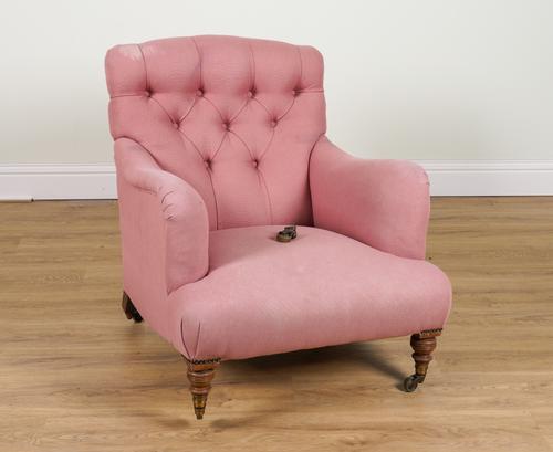 HOWARD AND SONS; A WALNUT FRAMED BUTTON-BACK EASY ARMCHAIR ON TURNED SUPPORTS
