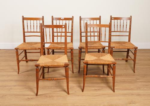 A SET OF SIX 19TH CENTURY STAINED BEECH SPINDLE BACK DINING CHAIRS (6)
