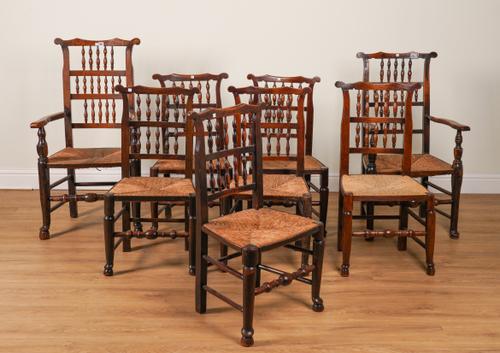 A MATCHED SET OF EIGHT 19TH CENTURY OAK AND ASH SPINDLE BACK DINING CHAIRS (8)