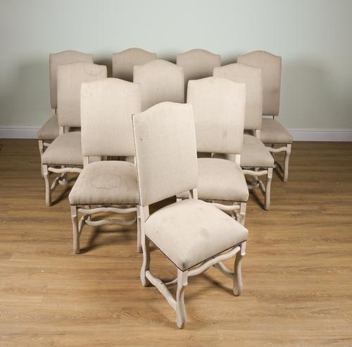 A SET OF TEN BLEACHED OAK FRAMED HUMP BACK DINING CHAIRS (10)