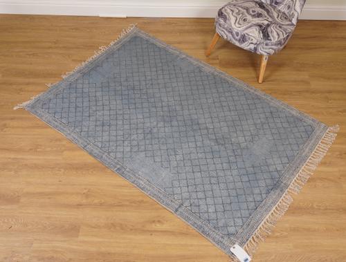 A GROUP OF FOUR WOVEN RUGS WITH PRINTED DESIGNS (4)