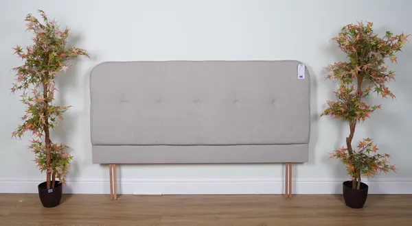 A BEIGE UPHOLSTERED QUEEN SIZE HEADBOARD