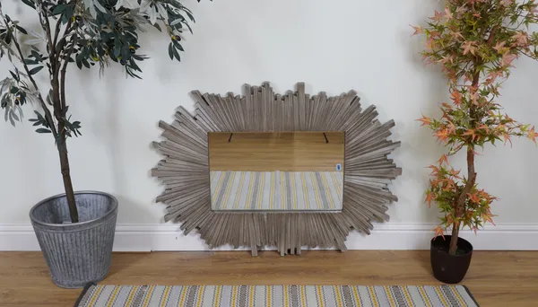 A SILVER PAINTED SUNBURST RECTANGULAR WALL MIRROR