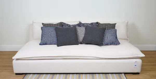 CUSHIONS, A GROUP OF NINE CUSHIONS IN NAVY BLUE, BLACK AND WHITE (9)