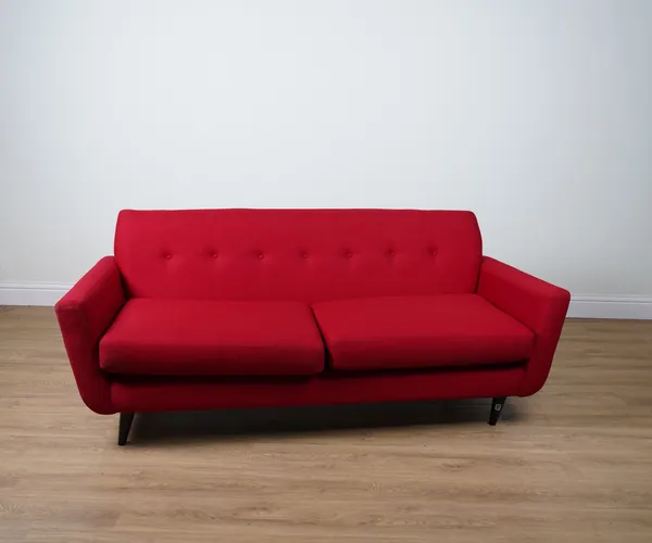 A THREE SEAT SOFA