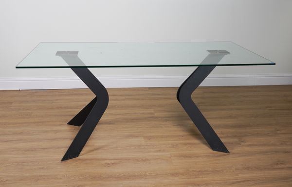 A GLASS RECTANGULAR DINING TABLE