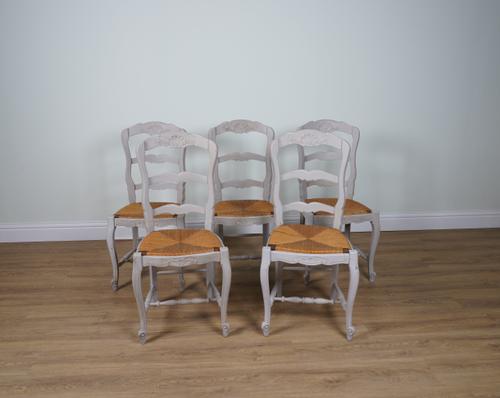 A SET OF SIX GREY PAINTED FRENCH LADDERBACK DINING CHAIRS (6)