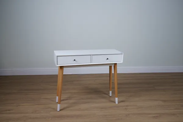 A WHITE TWO DRAWER SIDE TABLE