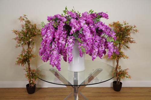 A LARGE BLOOM OF DEEP PINK FAUX WISTERIA