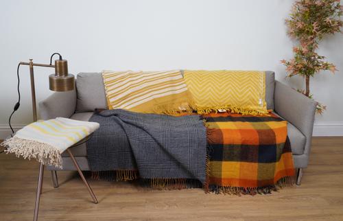 A DOGTOOTH THROW WITH OPPOSING SQUARE CHECK PATTERN (4)