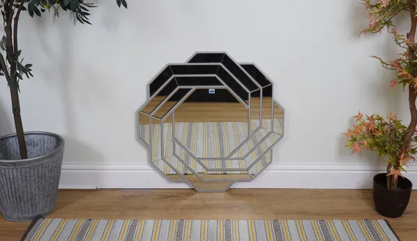 A SILVER PAINTED OCTAGONAL WALL MIRROR