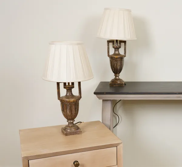 LIGHTING, A PAIR OF WOODEN URN SHAPED TABLE LAMPS WITH PLEATED SHADES (2)