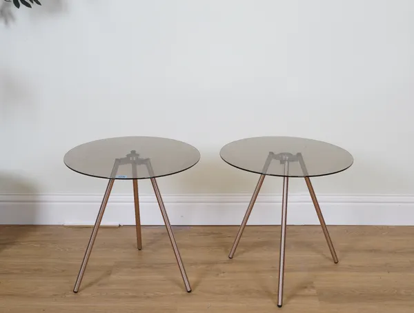 A PAIR OF CIRCULAR SMOKED GLASS OCCASIONAL TABLES (2)