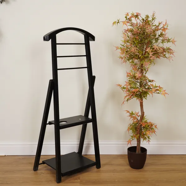 A MODERN BLACK VALET STAND