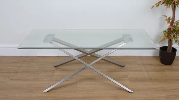 A BRUSHED STEEL AND GLASS RECTANGULAR COFFEE TABLE