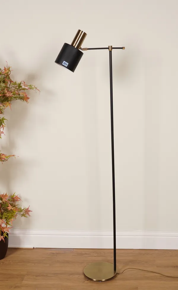 R V ASTLEY, A TALL MATT BLACK AND BRASS FLOOR STANDING LAMP