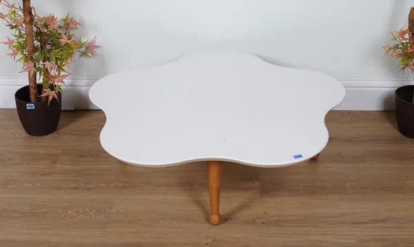 A WHITE LACQUER CIRCULAR SHAPED COFFEE TABLE