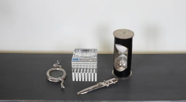 RALPH LAUREN, A GLASS CUBE PAPERWEIGHT AND A LEATHER AND CHROME SAND TIMER (4)