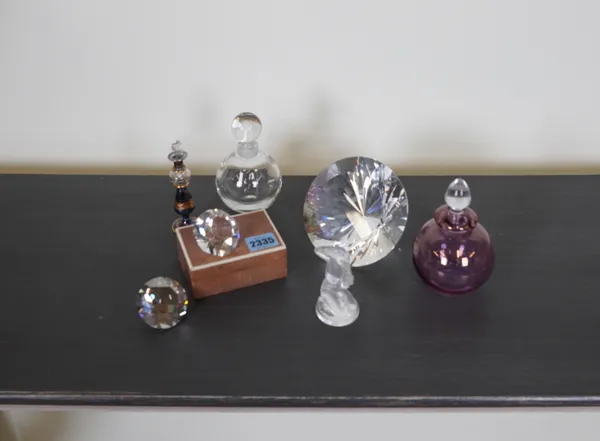 DECORATIVE OBJECTS COMRPSING THREE GLASS FACETED PAPERWEIGHTS (8)