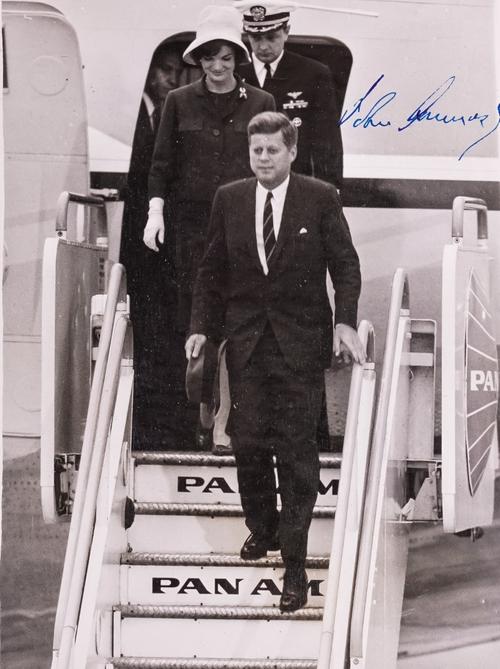 KENNEDY, John F. (1917-63, 35th President of the United States of America). A monochrome photograph of the President, SIGNED "John Kennedy", in window mount, dated 4.6.1961 on the verso.