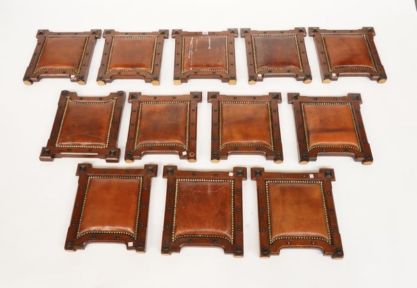 A SET OF TWELVE VICTORIAN OAK AND EBONISED FRAMED LEATHER CHAIR BACKS  (12)