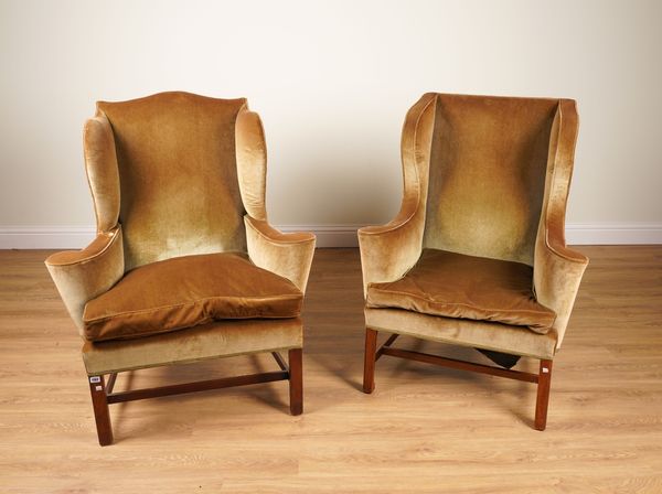 A NEAR PAIR OF 19TH CENTURY MAHOGANY FRAMED SHAPED WINGBACK ARMCHAIRS OF QUEEN ANNE DESIGN (2)