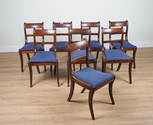 A SET OF EIGHT REGENCY MAHOGANY SABRE LEG DINING CHAIRS (8)