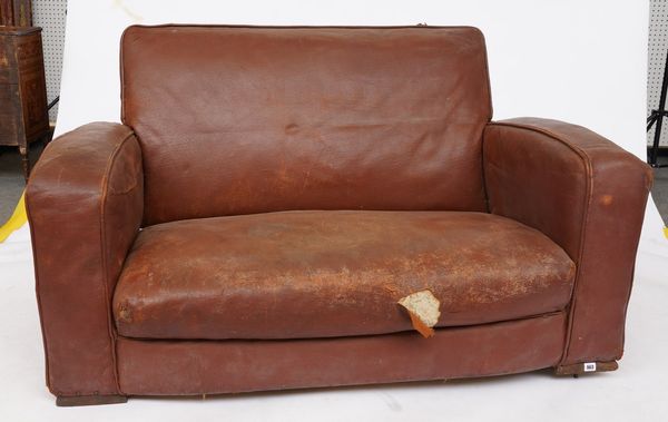 A MID-20TH CENTURY LEATHER COVERED TWO SEATER SOFA