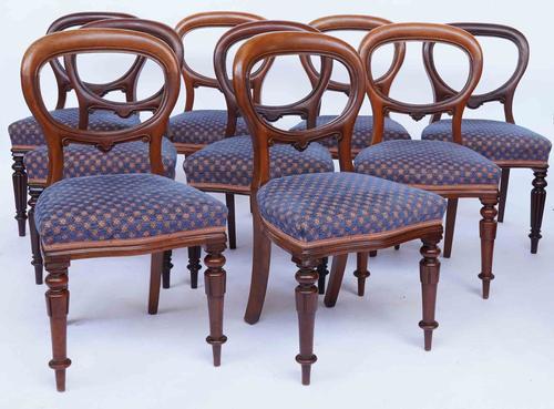 A MATCHED SET OF NINE VICTORIAN MAHOGANY OVAL BACK DINING CHAIRS (9)