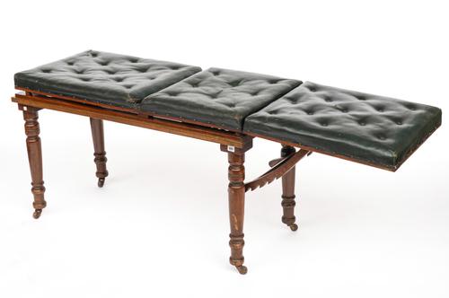 W.H BAILEY AND SON LTD; A LATE 19TH CENTURY OAK FRAMED ADJUSTABLE SURGEON'S BENCH