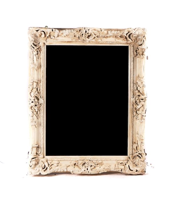 A LOUIS XV STYLE WHITE PAINTED COMPOSITION PICTURE FRAME MIRROR