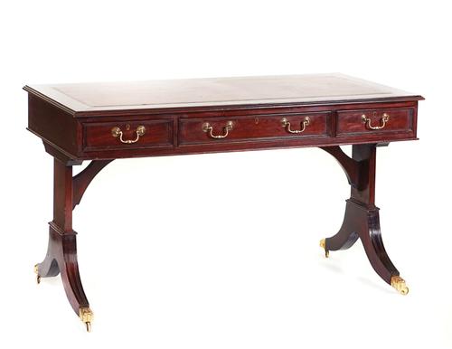 A GEORGE III STYLE RECTANGULAR THREE DRAWER WRITING TABLE