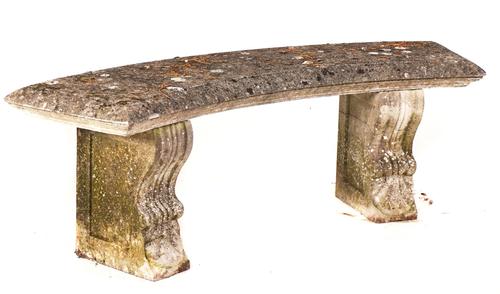 A RECONSTITUTED STONE SEMI ELLIPTIC GARDEN BENCH