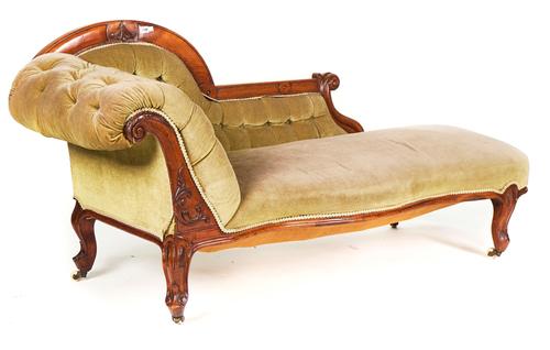 A VICTORIAN WALNUT FRAMED SHAPED BACK CHAISE LONGUE
