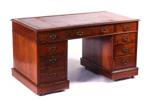 A LATE VICTORIAN MAHOGANY KNEE-HOLE DESK