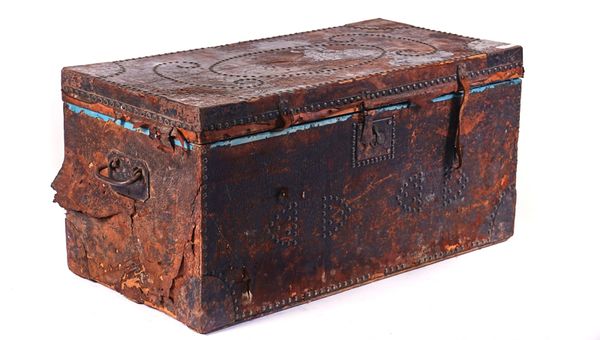 A LATE VICTORIAN LEATHER UPHOLSTERED TRUNK