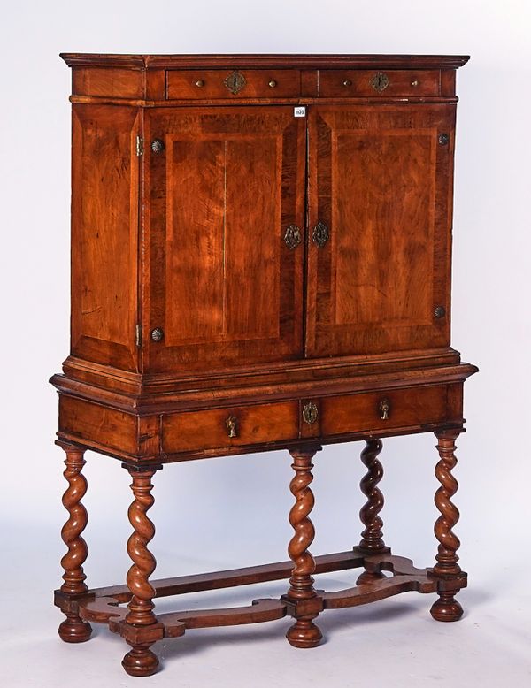 A WILLIAM AND MARY WALNUT CROSSBANDED CHEST ON LATER STAND