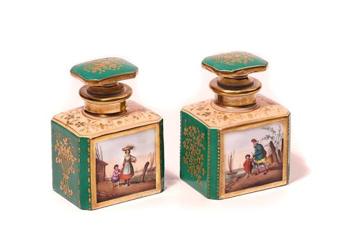 A PAIR OF PARIS PORCELAIN GREEN-GROUND RECTANGULAR PERFUME BOTTLES AND STOPPERS