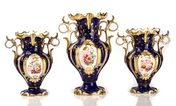 A GARNITURE OF THREE ENGLISH PORCELAIN BLUE GROUND TWO-HANDLED VASES