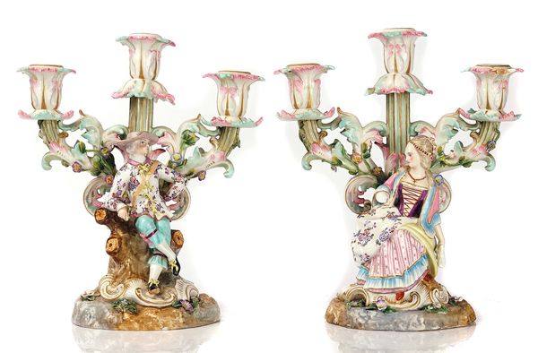 A PAIR OF FRENCH PORCELAIN THREE- LIGHT CANDELABRA