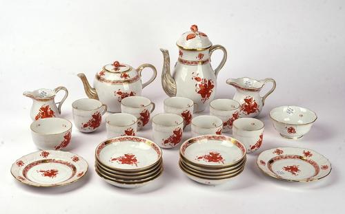 A HEREND PART TEA AND COFFEE SERVICE IN THE CHINESE BOUQUET RUST PATTERN