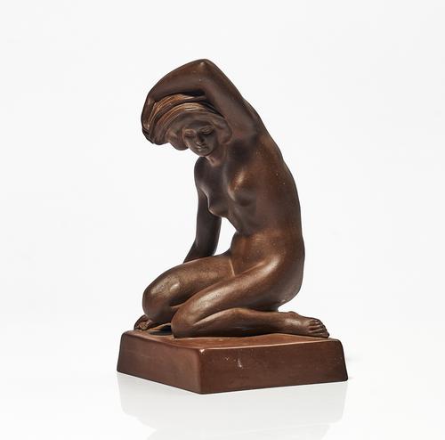 A MEISSEN BOTTGER STONEWARE FIGURE OF GIRL KNEELING