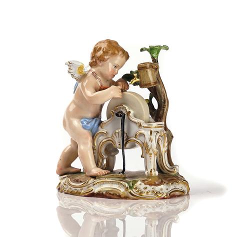 A MEISSEN FIGURE OF CUPID