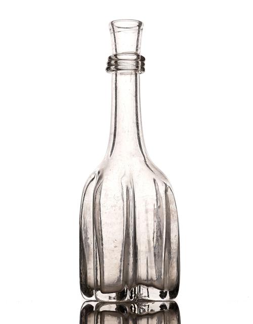 A GLASS CRUCIFORM DECANTER