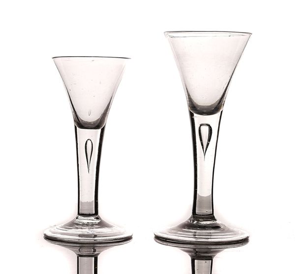 THREE PLAIN STEMMED WINE GLASSES