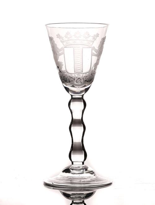 A DUTCH ENGRAVED ARMORIAL WINE GLASS