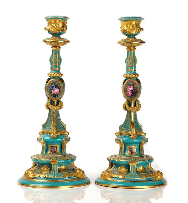 A PAIR OF RUSSIAN PORCELAIN CANDLESTICKS