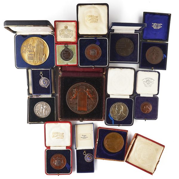 A COLLECTION OF THIRTEEN MEDALLIONS (13)