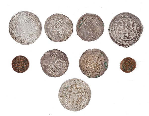 A GROUP OF NINE ISLAMIC COINS (9)